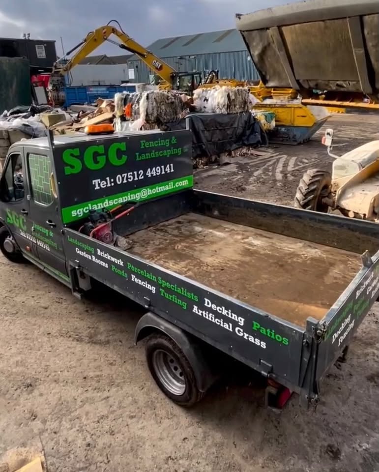 SGC's branded landscaping truck at work